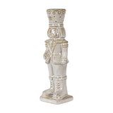 Hill Interiors ceramic nutcracker figure in white with gold-toned detailing on the crown, uniform and boots, shown against a plain white background.