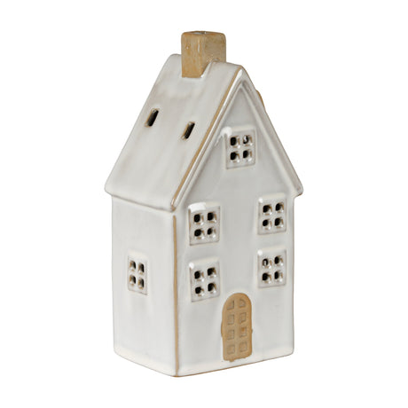 Hill Interiors ceramic large townhouse LED light in white with pitched roof, chimney, sash-style windows and arched door on a plain background.