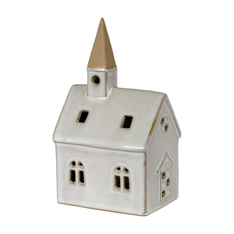 Hill Interiors ceramic LED church ornament in white with arched windows, peaked roof and slender gold-tipped tower, shown on a plain background.