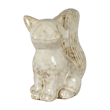 Hill Interiors ceramic fox ornament in a smooth white glaze with a bushy upright tail, head turned left in a seated pose, shown on a plain white background.