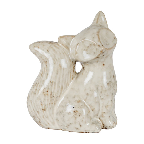 Hill Interiors ceramic fox ornament in glazed white with speckled detailing, head turned right and bushy tail curled, shown against a plain white background.