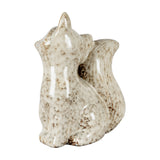 Hill Interiors ceramic fox ornament in speckled white glaze, seated with head turned and bushy tail curled, shown against a plain white background.