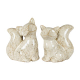 Hill Interiors ceramic fox ornaments in glazed white, shown as a pair with heads turned and bushy tails raised, on a plain white background.