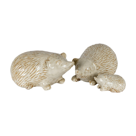 Hill Interiors Ceramic Small Hedgehog Ornaments in white with textured spine detailing, shown as a group of three in varying sizes on a plain background.