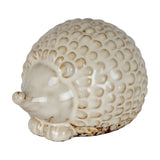 Hill Interiors ceramic hedgehog ornament in white glaze with textured spines, shown in profile against a plain white background.