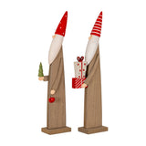 Pair of Hill Interiors wooden festive elves in brown with tall red hats, one holding a green tree with bell, the other holding stacked presents.