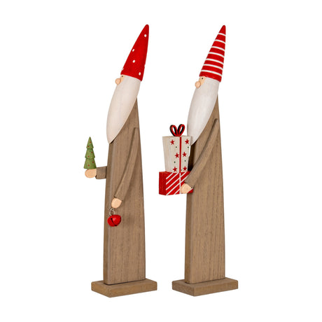 Pair of Hill Interiors wooden festive elves in brown with tall red hats, one holding a green tree with bell, the other holding stacked presents.