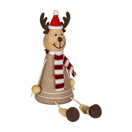 Hill Interiors wooden sitting reindeer decoration with antlers, red Santa hat, striped scarf and dangling bead legs, on a plain white background.