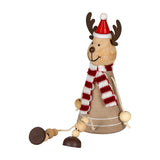 Hill Interiors wooden sitting reindeer decoration with antlers, red Santa hat, red and white striped scarf and dangling beaded legs, on a white background.