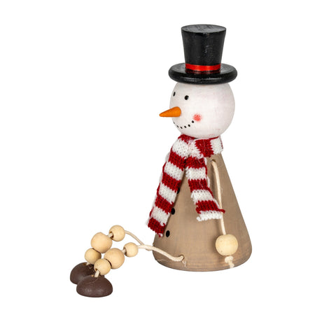 Hill Interiors Wooden Sitting Snowman Decoration in brown with a black top hat, red and white striped scarf, carrot nose and beaded legs.