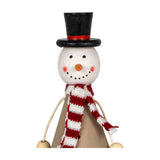 Hill Interiors wooden sitting snowman decoration with black top hat, red and white striped knitted scarf, and brown cone body on a white background.