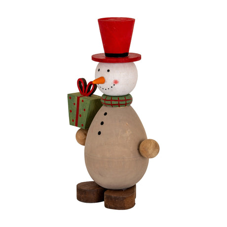 Hill Interiors Wooden Snowman with Present in brown, wearing a red top hat and green scarf, holding a green gift box, on a white background.