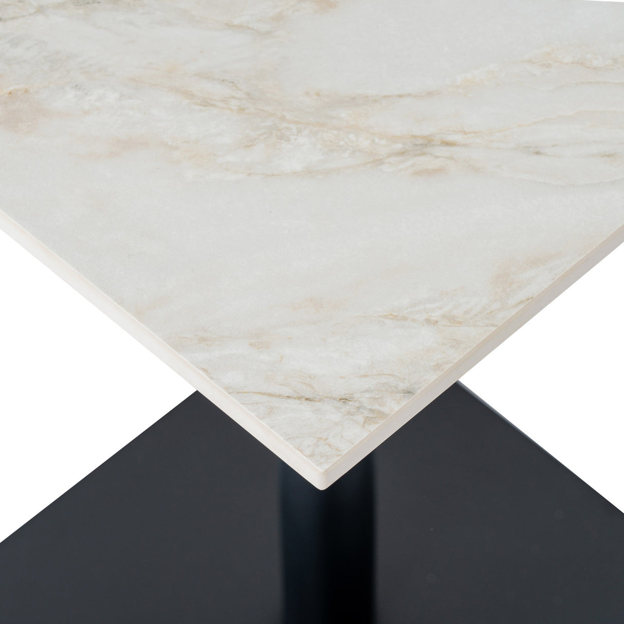 Close-up of the Hill Interiors Stanwyke Square Dining Table showing the beige stone-effect top and black metal pedestal base against a white background.
