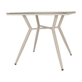 Hill Interiors Round Glass Side Table in beige with a glass top and slender four-leg metal base, shown on a plain white background.