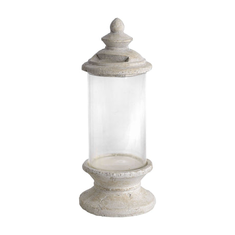 Hill Interiors Large Glass Candle Lantern in cream with a clear glass cylinder, sculpted stone-effect lid and pedestal base, on a plain background.