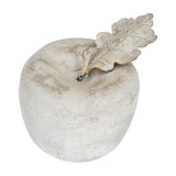 Hill Interiors Stone Decorative Apple in beige with a sculpted leaf and stem, shown from above on a plain white background.