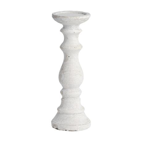 Hill Interiors medium beige stone pillar candle holder with a turned column shape and textured finish, shown against a plain white background.