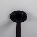 Close-up of the Holmes 5 Light Spotlight Bar's matt black ceiling canopy with leather strap suspension, set against a plain light background.