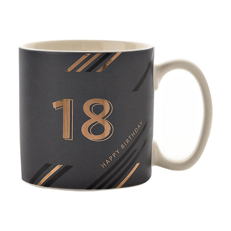 Orion 18 Happy Birthday mug in dusky blue with a large metallic "18", angled metallic lettering, diagonal stripe accents, and a cream interior and handle, shown on a plain white background.