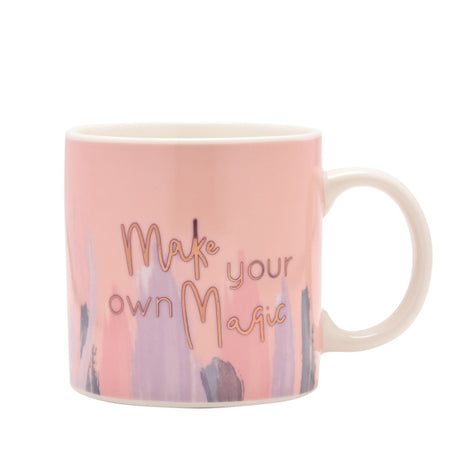 Porcelain 30th birthday mug in blush pink with cream handle and rim, featuring "Make your own Magic" script over watercolour-style brushstrokes in lilac and grey, shown on a white background.