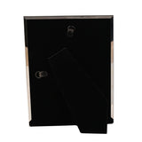 Rear view of the Luxe Pastel Brushstroke metal photo frame, 6 x 4in, showing black velvet backing, two hanging hooks and a fold-out metal easel stand on a white background.