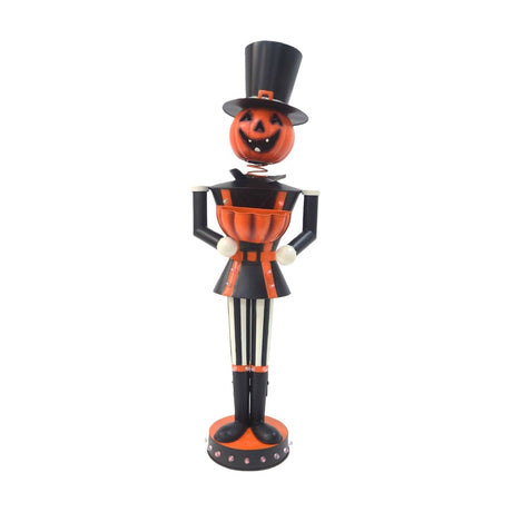 Metal nutcracker garden ornament with a jack-o'-lantern head on a spring, black top hat, black and orange jacket, striped legs, and black boots on a round base, shown on a plain white background.