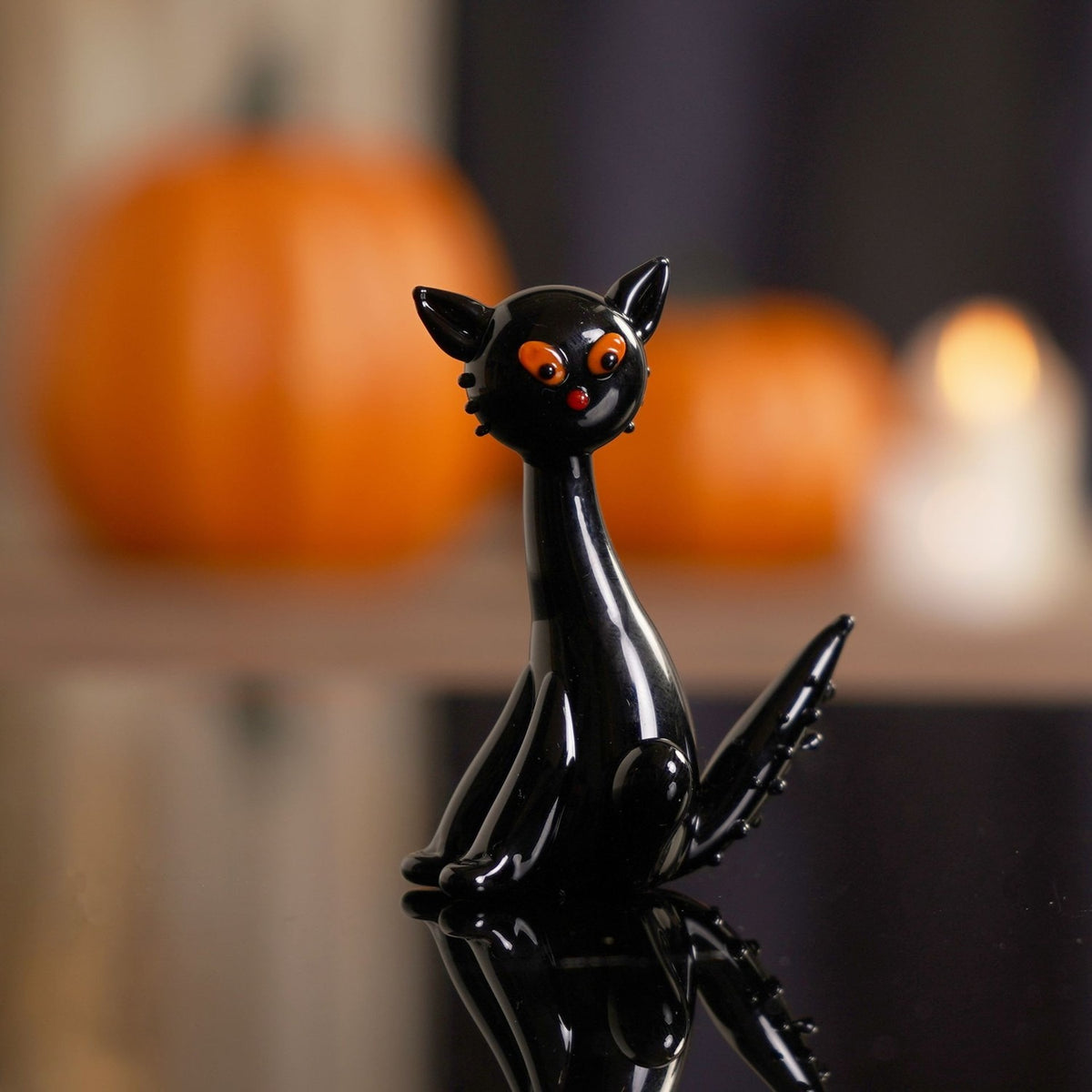 Seated Cat Miniature Glass Figurine with Orange Eyes - Black