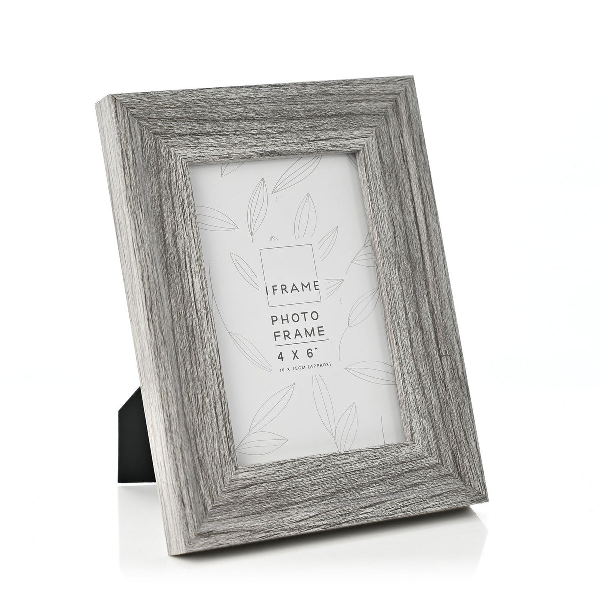 Grey embossed wood-effect photo frame with wide stepped moulding and rear easel stand, shown at an angle on a plain white background, holds a 4 x 6" photo.