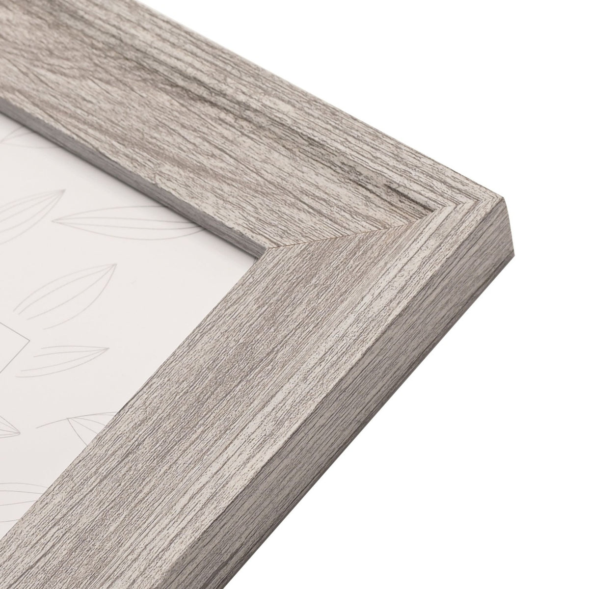 Close-up corner view of a rectangular photo frame with an embossed wood-effect finish in soft mid grey, showing stepped moulding and textured grain detail against a white background.