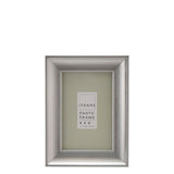 Traditional rectangular easel photo frame in brushed silver finish with sloped moulding, shown for a 4 x 6" photo on a plain white background.
