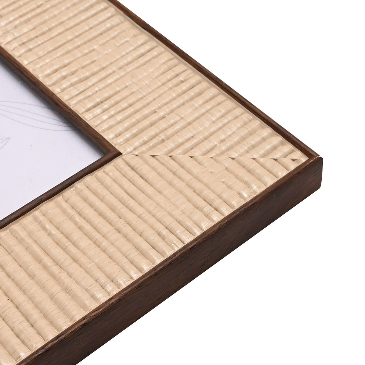 Close-up of the Rattan Effect Recycled Photo Frame in natural, showing ribbed woven-texture border with mitred corners and a slim dark brown edge, on a white background.