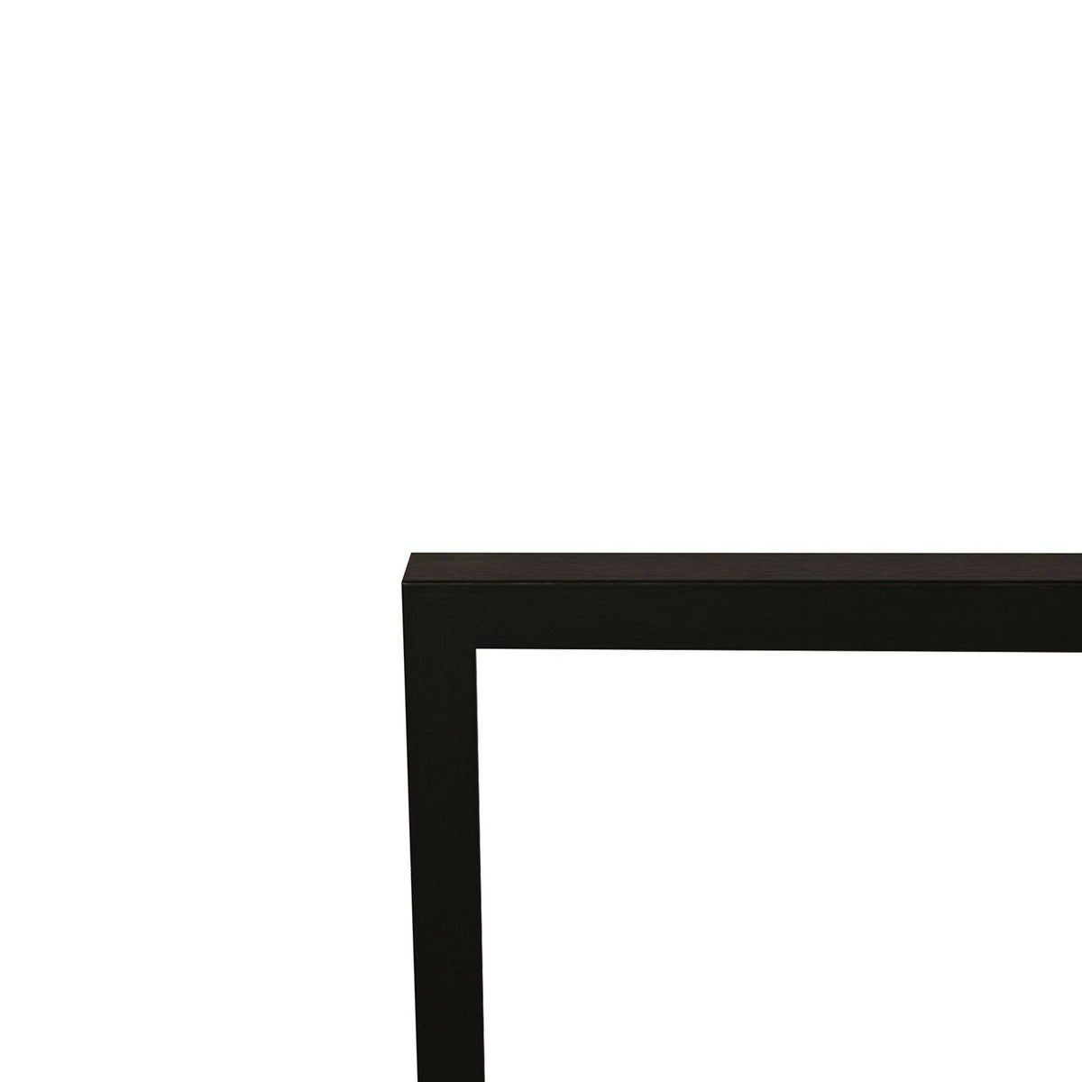 Close-up of a rectangular wooden poster photo frame in black, showing the squared corner joint and fine wood grain against a plain white background.
