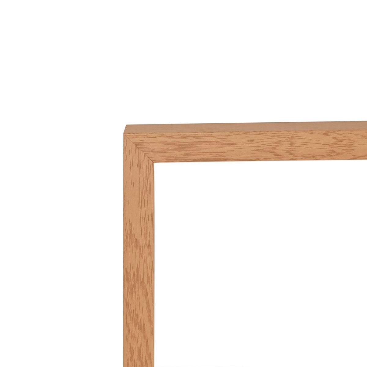 Close-up of a wooden poster photo frame corner in natural oak finish, showing visible wood grain, on a plain white background.
