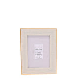 Rectangular 4x6 photo frame with a textured white face and thin gold-edged border, shown upright on a plain white background.