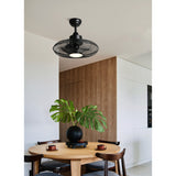 Igeldo Ceiling Fan with Light in matt black iron, caged round design with integrated LED shade, mounted above a dining table in a kitchen setting.