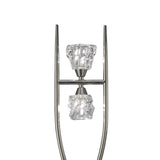 The Iku 4 Light Floor Lamp - Satin Nickel features a modern metallic frame with two vertically arranged clear, textured glass shades between parallel rods.
