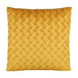 Iles Cushion in mustard yellow, a square cushion with a diagonal basketweave front of folded fabric strips in soft velvet-look polyester, shown on a plain white background.