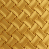 Iles Cushion in deep ochre yellow, close-up of the woven front panel with diagonal fabric strips folded into a basketweave pattern with a soft sheen.