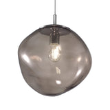 Saxa Glass Pendant Light - 35cm, a single-light fitting with an organic, irregular smoked grey blown glass shade and chrome ceiling mount, shown with visible E27 bulb on a plain white background.