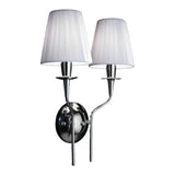 Opera 2 Light Wall Light with chrome metal frame, twin curved arms, and two white pleated fabric shades on candle-style holders, set against a plain white background.