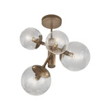 Global 4 Light Bubble Ceiling Light, a flush fitting with four clear acrylic globe shades in varying sizes on branching antique brass arms, shown on a plain white background.