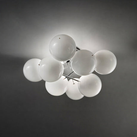 Atom 4 Light Globe Glass Ceiling Light in chrome, flush fitting with clustered white glass globes on a slim chrome frame, shown against a plain grey background.