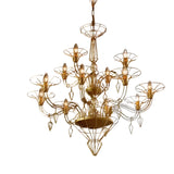 Dedalo 12 Light Chandelier in gold-toned metal, featuring twelve scrolled wire arms with cup shades and a trama metallica wire diffuser, shown on a plain white background.