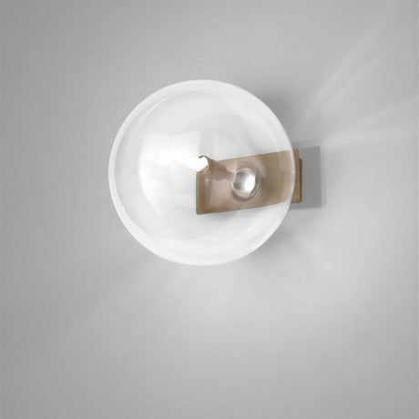 Estro Glass Globe Wall Light with a clear spherical glass diffuser and bronze metal backplate, single G9 light source, shown on a plain grey background.