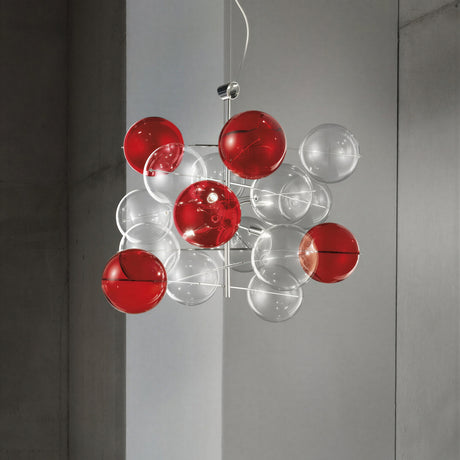 Atom 3 Light Globe Glass Chandelier in chrome, featuring clustered clear and red glass bubbles on a central rod, shown suspended against a grey wall.