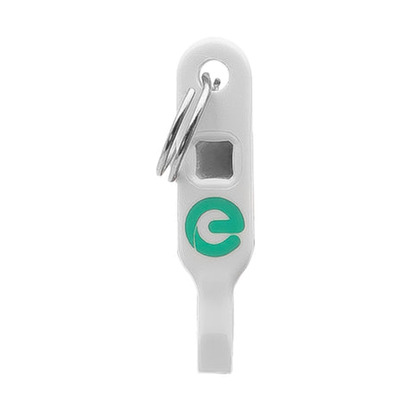 Espire Alarm Multi Tool in white ABS with green logo and metal keyring loop, shown on a plain white background.