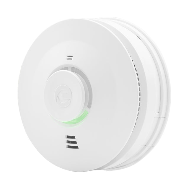 Espire round white ceiling-mounted smoke and heat alarm with central test button, green indicator light, and side vents on a plain background.
