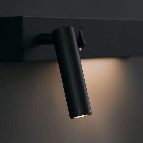 Interior view of Comodo LED Wall Light, black, blending seamlessly into sophisticated settings