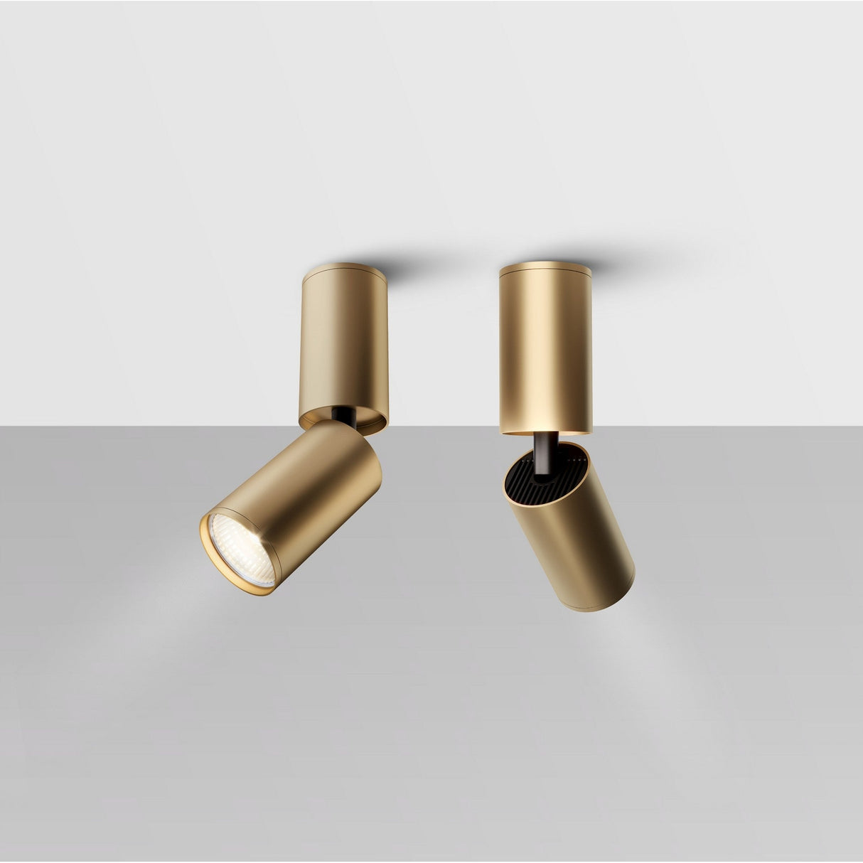 Interior view of Focus S Long Single Surface-Mounted Spotlight in gold, enhancing a modern space with warm lighting