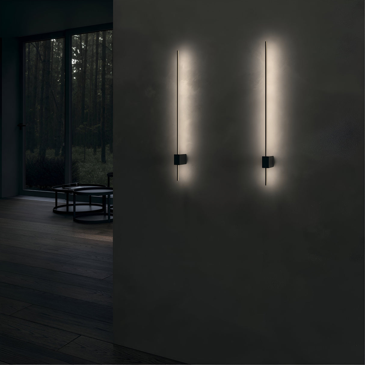 Pars black and gold LED wall light, shown in an interior, adding refined elegance to the space.